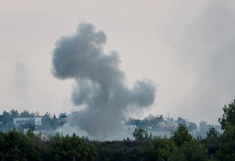 Smoke rises after Israeli shelling , as seen from Lebanese side, near the border with Israel, in Alma Al-Shaab, southern Lebanon, October 13, 2023. REUTERS/Thaier Al-Sudani