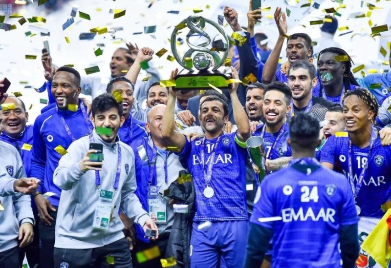 Al Hilal players celebrate winning the Asian Champions League last month. (SPA)