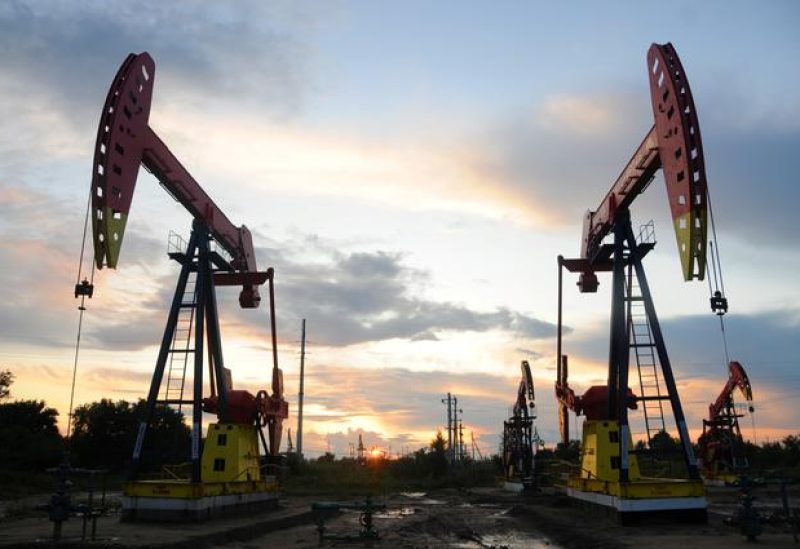 Pumpjacks are seen during sunset at the Daqing oil field in Heilongjiang province, China August 22, 2019. REUTERS/Stringer/File photo