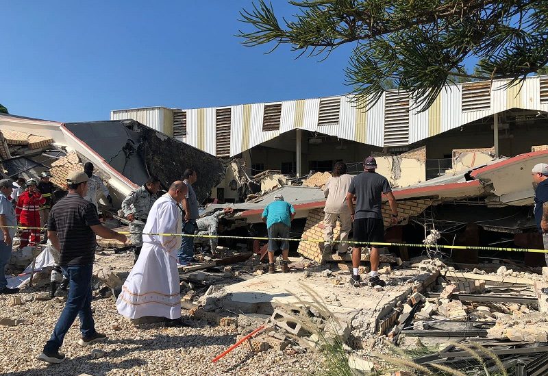 Members of security forces, people and a priest work at a site where a church roof collapsed during Sunday mass in Ciudad Madero, in Tamaulipas state, Mexico in this handout picture distributed to Reuters on October 1, 2023. Secretaria de Seguridad Publica Tamaulipas/Handout via REUTERS THIS IMAGE HAS BEEN SUPPLIED BY A THIRD PARTY. NO RESALES. NO ARCHIVES