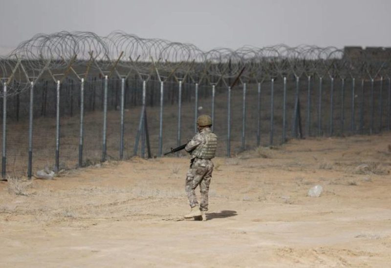 An Iraqi soldier patrols the border with Syria.
