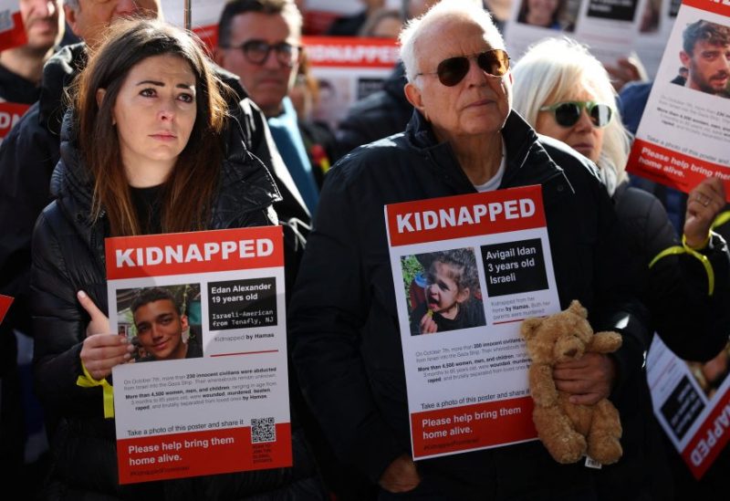 Families and supporters of hostages that are being held in Gaza after they were kidnapped from Israel by Hamas gunmen on October 7, hold a demonstration to demand their immediate release, outside of the Houses of Parliament in London, Britain, November 5, 2023. REUTERS/Toby Melville