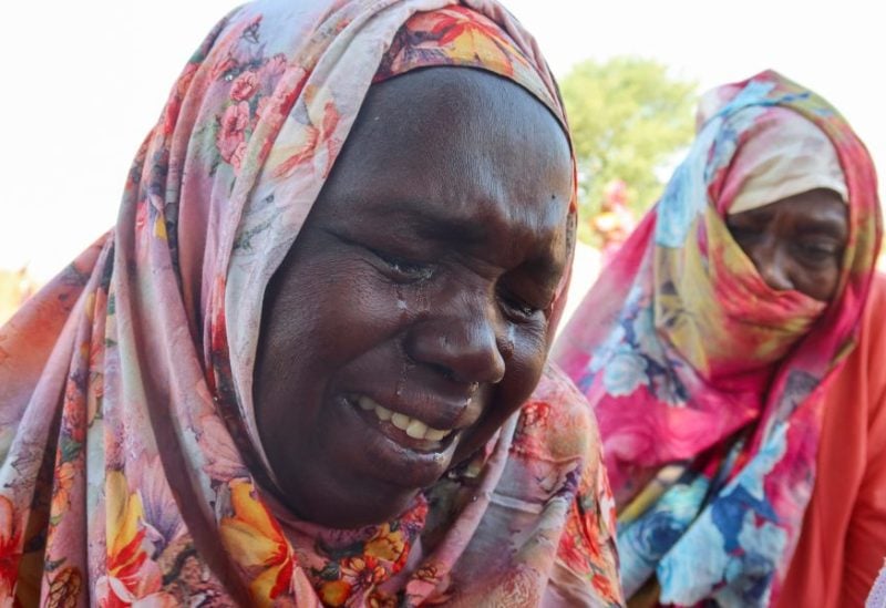 Women from the city of Al-Junina (West Darfur) cry after receiving the news about the death of their relatives as they waited for them in Chad, November 7, 2023. REUTERS/El Tayeb Siddig/ File photo