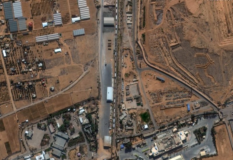 A satellite image shows humanitarian-associated trucks queueing to enter the Rafah border crossing between Gaza and Egypt, amid the ongoing conflict between Israel and the Palestinian Islamist group Hamas, November 7, 2023. Maxar Technologies/Handout via REUTERS