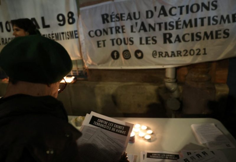 People attend a demonstration against antisemitism and xenophobia, organized by the Action Network against Anti-Semitism and All Racisms (Raar) and the Memorial98 associations, as a surge in anti-Semitic offences increased in France, amid the ongoing conflict between Israel and Palestinian Islamist group Hamas, near the Gymnase Japy in Paris, France, November 9, 2023. REUTERS/Claudia Greco