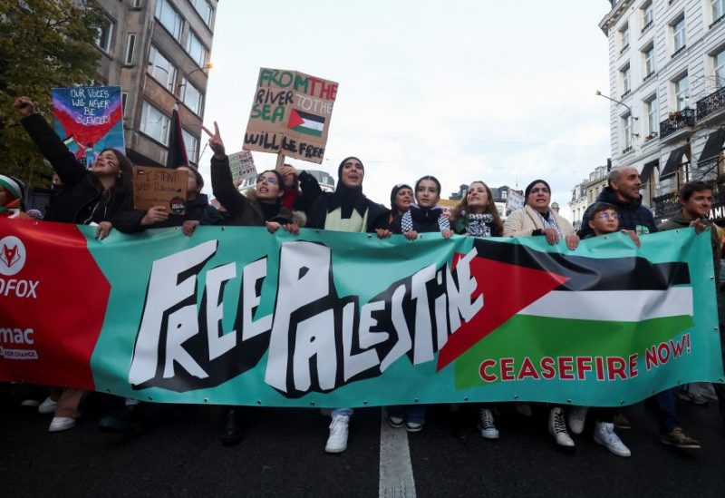 People take part in a protest in support of Palestinians in Gaza, as the conflict between Israel and Palestinian Islamist group Hamas continues, in Brussels, Belgium, November 11, 2023. REUTERS/Yves Herman