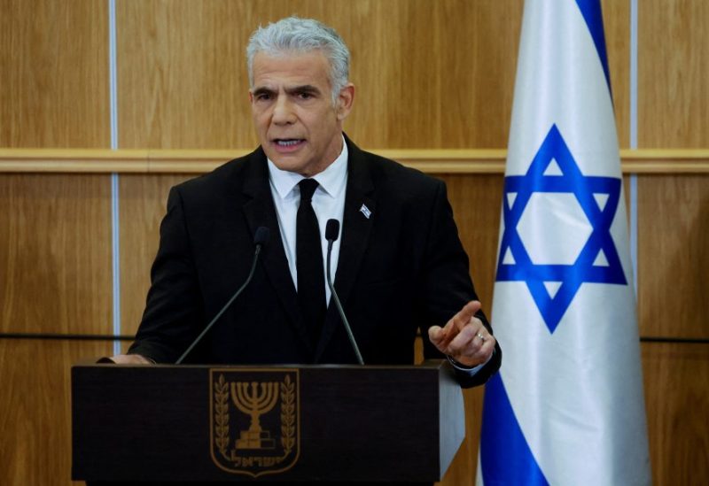 Israeli opposition leader Yair Lapid delivers a statement at the Knesset, Israel's parliament, on the day Israel's constitution committee is set to start voting on changes that would give politicians more power on selecting judges while limiting Supreme Court powers to strike down legislation, in Jerusalem, February 13, 2023. REUTERS/Amir Cohen/File Photo