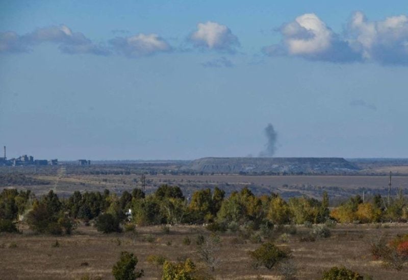 Smoke rises above a terricon in the area of the frontline town of Avdiivka on October 18, 2023, amid the ongoing Russian military action in Ukraine