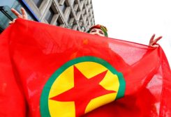 A woman holds a flag of the PKK (Kurdistan Workers' Party) during a demonstration against Turkish President Tayyip Erdogan in central Brussels, Belgium, November 17, 2016. REUTERS/Yves Herman/ File Photo