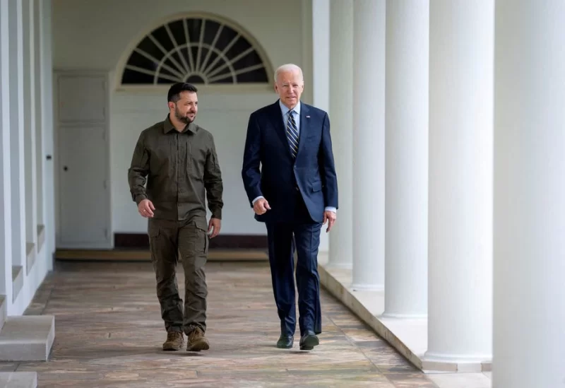 Ukrainian President Volodymyr Zelenskiy walks down the White House colonnade to the Oval Office with U.S. President Joe Biden during a visit to the White House in Washington, U.S., September 21, 2023