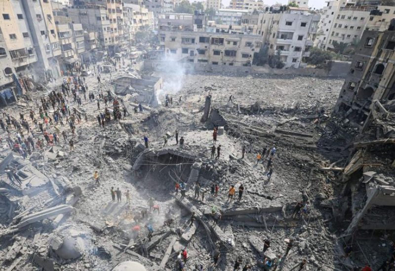 Palestinians inspect the damage following an Israeli airstrike on the Sousi mosque in Gaza City on October 9, 2023.