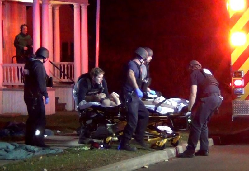 First responders wheel a victim to an ambulance after a gunman shot and wounded three college students of Palestinian descent in Burlington, Vermont, U.S. November 25, 2023 in a still image from video. Courtesy Wayne Savage via REUTERS. THIS IMAGE HAS BEEN SUPPLIED BY A THIRD PARTY. MANDATORY CREDIT