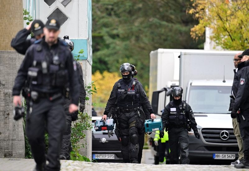 German police walk at the Islamic Center Hamburg grounds during a raid, due to suspicion of members acting against a constitutional order and supporting the militant group Hezbollah in Hamburg, Germany, November 16, 2023. REUTERS/Fabian Bimmer