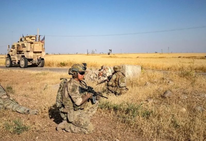 US troops take position as they patrol near an oil field in al-Qahtaniyah in Syria's northeastern Hasakah province, June 14, 2023.