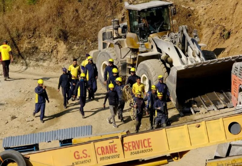 Rescue members from State Disaster Response Force (SDRF) arrive at the tunnel where workers are trapped after the tunnel collapsed in Uttarkashi, in the northern state of Uttarakhand, India, November 23, 2023. (Reuters)