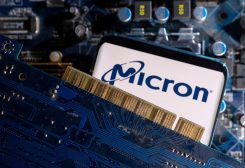 FILE PHOTO: A smartphone with a displayed Micron logo is placed on a computer motherboard in this illustration taken March 6, 2023. REUTERS/Dado Ruvic/Illustration/File Photo