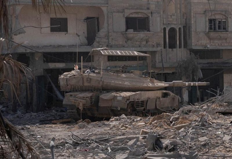 An Israeli tank is seen, amid the ongoing conflict between Israel and the Palestinian Islamist group Hamas, at a location given as Gaza in this handout photo released November 7, 2023. Israeli Defence Forces/Handout via REUTERS THIS IMAGE HAS BEEN SUPPLIED BY A THIRD PARTY