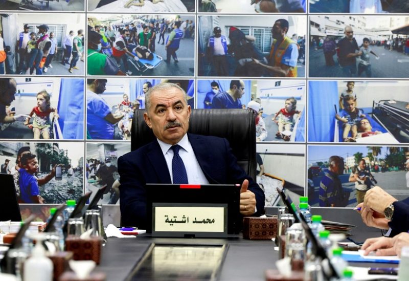Palestinian Prime Minister Mohammad Shtayyeh attends a cabinet meeting in the city of Ramallah in the Israeli-occupied West Bank October 16, 2023, amid the ongoing battles between Israel and the Palestinian Islamist group Hamas. JAAFAR ASHTIYEH/Pool via REUTERS