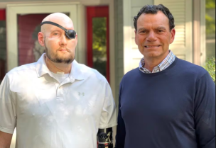 Aaron James of Hot Springs, Arkansas, poses with Dr. Eduardo D. Rodriguez after he underwent surgery for the world’s first whole-eye transplant as part of a partial face transplant at NYU Langone in an undated photograph. James survived a deadly 7200-volt electric shock