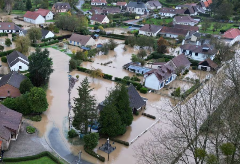 An aerial view shows a flooded area in Estree as the Canche River overflows near Montreuil-sur-Mer after days of heavy rain causing flooding in northern France, November 10, 2023
