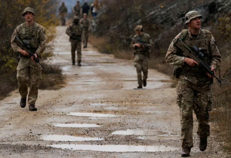 British troops part of the NATO reinforcements patrol at the Kosovo-Serbia border in Jarinje, Kosovo November 24, 2023
