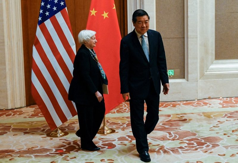 FILE PHOTO: US Treasury Secretary Janet Yellen walks with China's Vice Premier He Lifeng during their meeting at the Diaoyutai State Guesthouse in Beijing on July 8, 2023. Pedro Pardo/Pool via REUTERS/File Photo