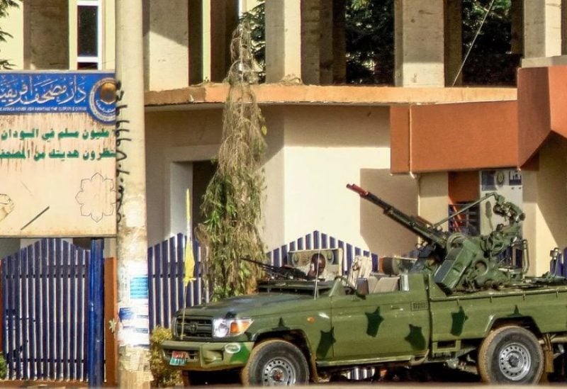 A technical vehicle (pickup truck mounted with turret) of Sudan's Rapid Support Forces (RSF) paramilitaries is stationed outside the offices of Dar al-Mushaf, in the south of Sudan's capital Khartoum on April 17, 2023. (AFP)