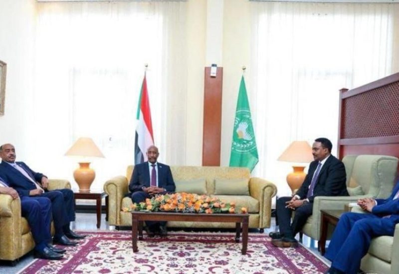 Abdel Fattah al-Burhan, Chairman of the Sovereign Council of Sudan, holds talks with IGAD’s Executive Secretary Workneh Gebeyehu in Djibouti on Sunday. (Sovereign Council)