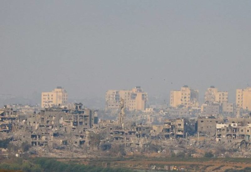 A view of damaged buildings in Gaza following artillery strikes, as seen from southern Israel, amid the ongoing conflict between Israel and the Palestinian group Hamas, November 14, 2023.