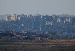A view shows the damaged buildings of Northern Gaza strip, as seen from the viewpoint in Sderot, South Israel, November 30, 2023. REUTERS/Alexander Ermochenko