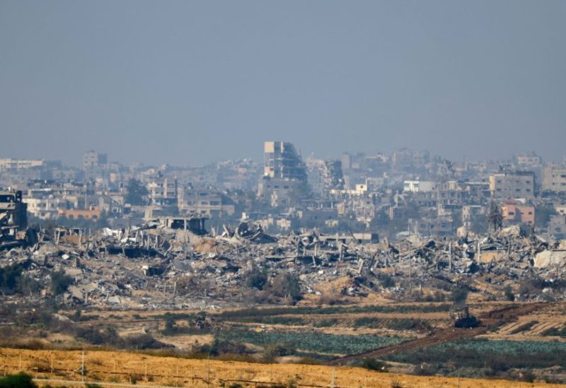 A view of damaged buildings in Gaza, after a temporary truce between Israel and the Palestinian Islamist group Hamas expired, as seen from southern Israel, December 2, 2023. REUTERS/Alexander Ermochenko