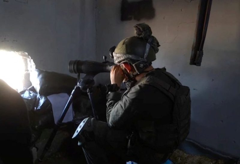 A member of the Israeli army operates in a location given as Gaza, amid the ongoing conflict between Israel and the Palestinian Islamist group Hamas, in this still image obtained from a handout video released December 3, 2023. Israel Defense Forces/Handout via REUTERS