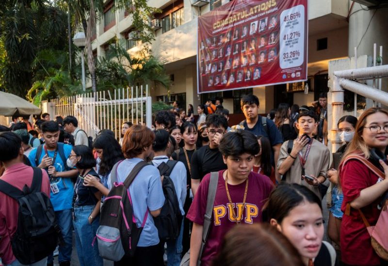 Students evacuate following an earthquake, in Manila, Philippines, December 5, 2023. REUTERS/Lisa Marie David