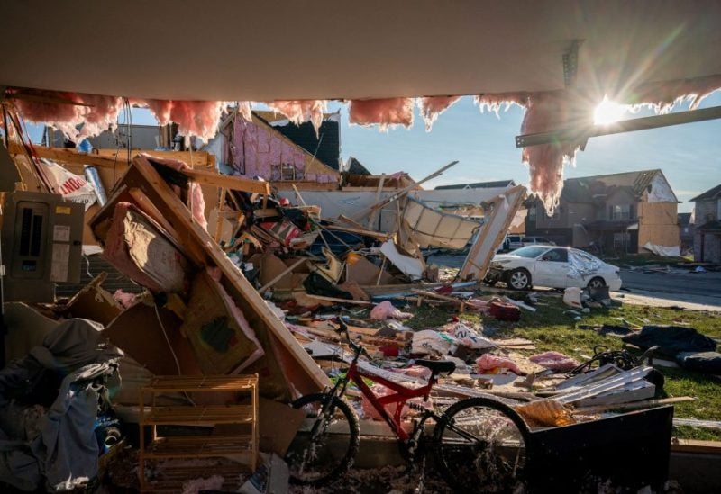 Debris spills from a damaged home after a tornado stuck Clarksville, Tennessee, U.S. December 10, 2023. Andrew Nelles/USA Today Network via REUTERS