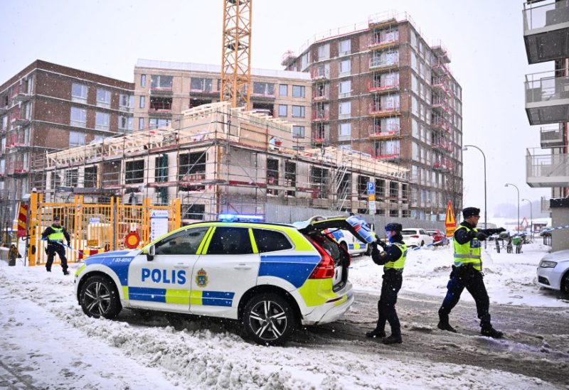Police officers work in front of a construction site following a construction elevator accident in Sundbyberg, north of Stockholm, Sweden December 11, 2023. Claudio Bresciani/TT News Agency/via REUTERS