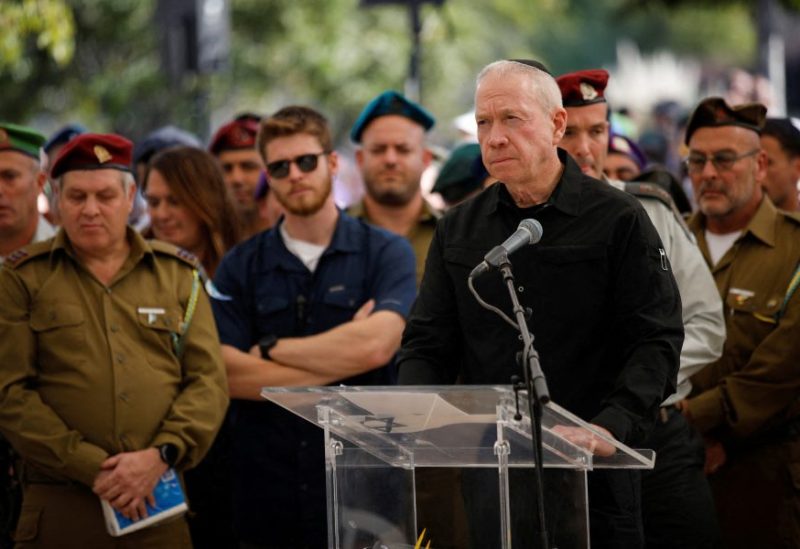 Israeli Defense Minister Yoav Gallant speaks at a ceremony for soldier Colonel Asaf Hamami, who was killed defending Kibbutz Nirim during the deadly October 7 attack by Palestinian Islamist group Hamas, at his funeral in Tel Aviv, Israel December 4, 2023. REUTERS/Shir Torem/File Photo