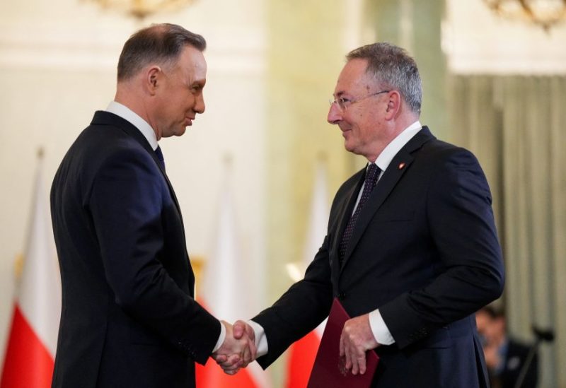 Polish President Andrzej Duda and newly appointed Polish Culture Minister Bartlomiej Sienkiewicz attend the cabinet swearing-in ceremony at the Presidential Palace in Warsaw, Poland December 13, 2023. REUTERS/Aleksandra Szmigiel