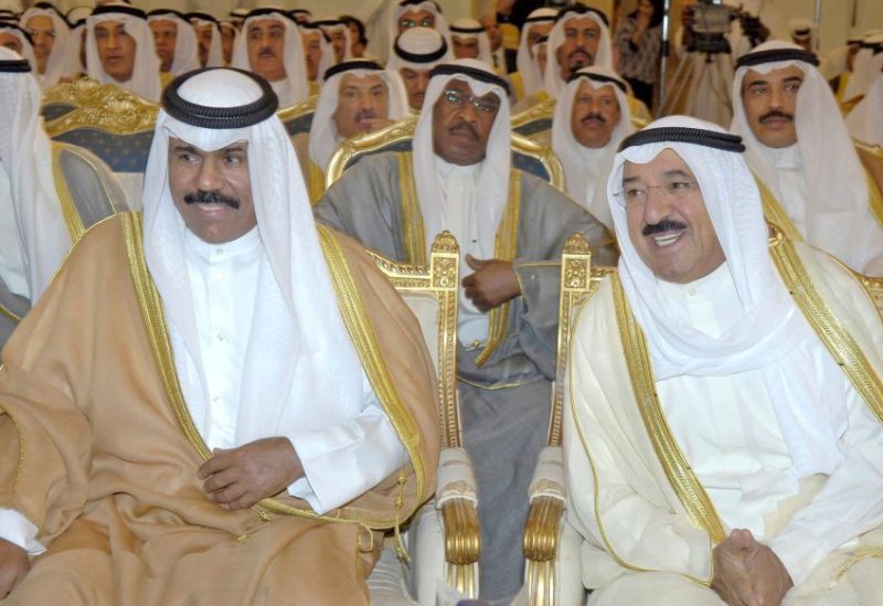 Kuwait's Emir Sheikh Sabah al-Ahmad al-Sabah (R) sits with Kuwait Crown Prince Sheikh Nawaf al-Ahmad al-Sabah during a Foreign Ministry function in Kuwait City, Kuwait April 10, 2006. REUTERS/Stephanie McGehee/File Photo
