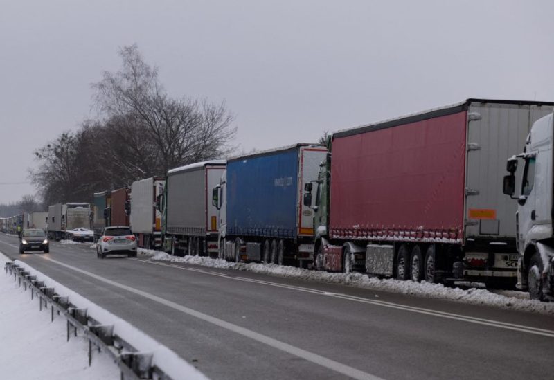 Trucks line up in a long queue to cross the Polish-Ukrainian border at the Dorohusk-Jagodzin crossing, in Okopy, Poland, December 4, 2023. REUTERS/Kuba Stezycki/File Photo