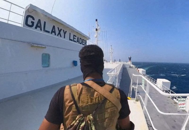 A Houthi fighter stands on the Galaxy Leader cargo ship in the Red Sea in this photo released November 20, 2023. Houthi Military Media/Handout via REUTERS THIS IMAGE HAS BEEN SUPPLIED BY A THIRD PARTY/File Photo