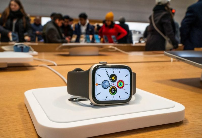 An Apple smartwatch is displayed as customers visit the Apple store in New York, U.S., December 26, 2023. REUTERS/Eduardo Munoz