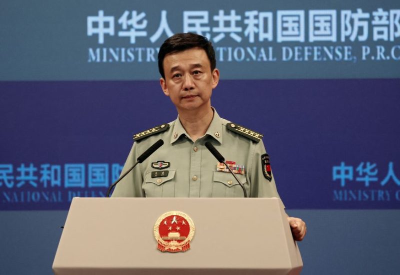 Chinese Defence Ministry spokesperson Wu Qian attends a press briefing in Beijing, China August 31, 2023. REUTERS/Shubing Wang