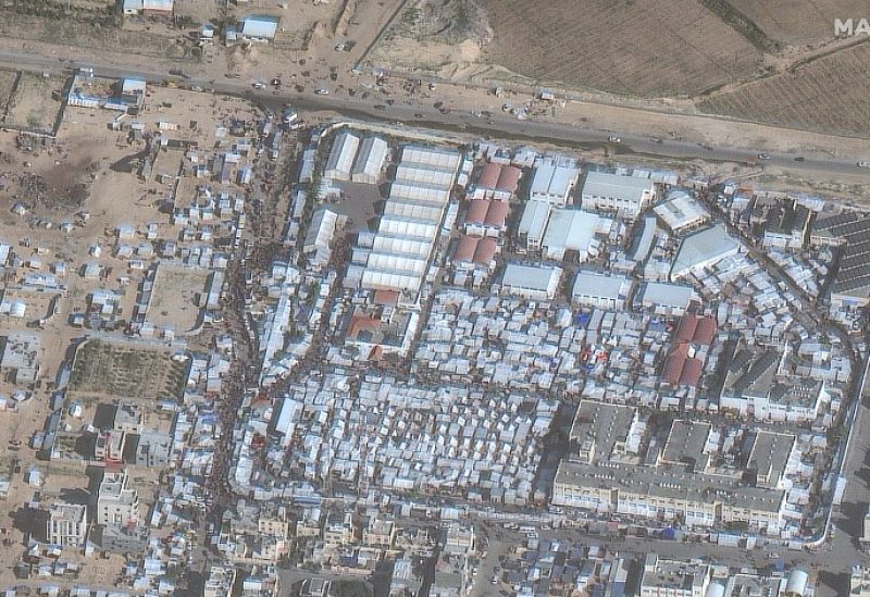 A satellite image shows gathered people and tents and shelters at a Khan Younis college, amid the ongoing conflict between Israel and Palestinian Islamist group Hamas, in Gaza December 3, 2023. Maxar Technologies/Handout via REUTERS THIS IMAGE HAS BEEN SUPPLIED BY A THIRD PARTY. NO RESALES. NO ARCHIVES. MANDATORY CREDIT. MUST NOT OBSCURE LOGO