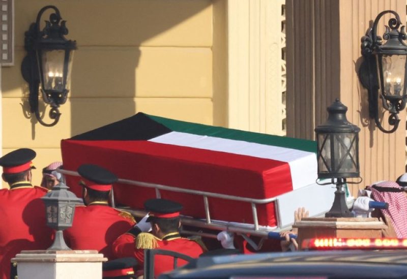 The coffin of Kuwait's late Emir Sheikh Nawaf al-Ahmad Al-Sabah is carried into the Bilal bin Rabah Mosque in Kuwait City during his funeral on December 17, 2023. Kuwait saw a quick transition to a new emir on December 16 following the death at 86 of Sheikh Nawaf al-Ahmad Al-Sabah after three years in power. (Photo by Yasser Al-Zayyat / AFP)
