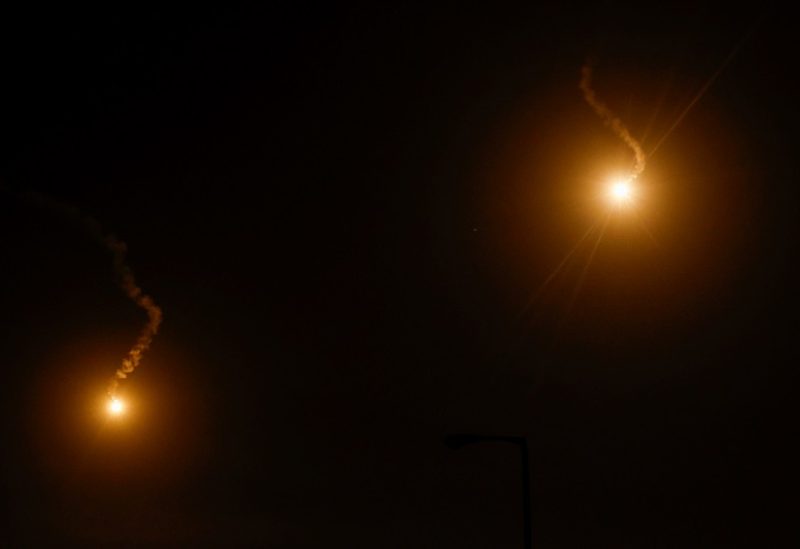 Flares fired by the Israeli military fly above Khan Younis, amid the ongoing conflict between Israel and the Palestinian Islamist group Hamas, in the southern Gaza Strip, December 3, 2023. REUTERS/Ibraheem Abu Mustafa
