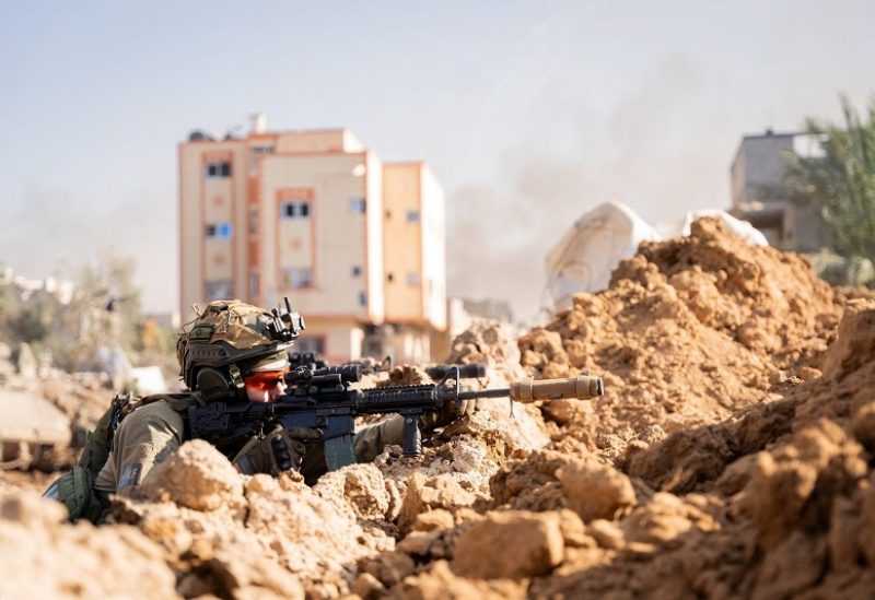 An Israeli soldier operates in the Gaza Strip amid the ongoing conflict between Israel and the Palestinian Islamist group Hamas, in this handout picture released on December 21, 2023. Israel Defense Forces/Handout via REUTERS THIS IMAGE HAS BEEN SUPPLIED BY A THIRD PARTY