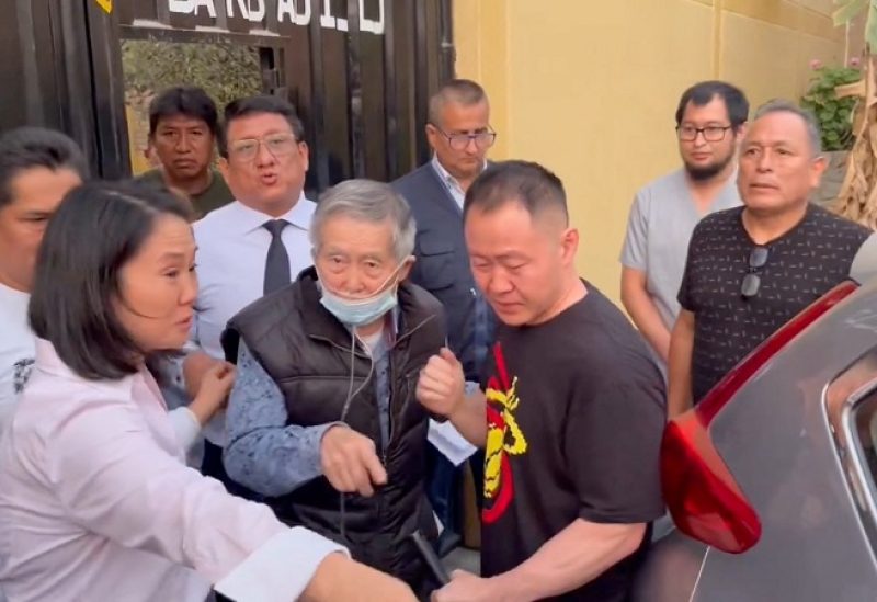 Former Peruvian President Alberto Fujimori, accompanied by his children Keiko and Kenji, leaves prison after being released following the restoration of a contentious 2017 pardon on humanitarian grounds, on the outskirts of Lima, Peru, December 6, 2023 in this screengrab from social media video. Courtesy Elio Riera/via REUTERS THIS IMAGE HAS BEEN SUPPLIED BY A THIRD PARTY. NO RESALES. NO ARCHIVES.