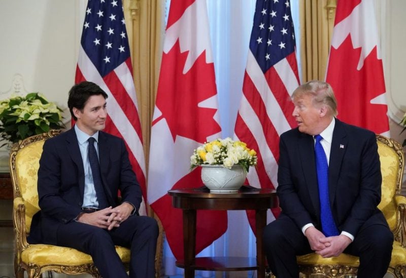 U.S. President Donald Trump and Canada's Prime Minister Justin Trudeau hold a meeting ahead of the NATO summit in Watford, in London, Britain, December 3, 2019. REUTERS/Kevin Lamarque/ File Photo