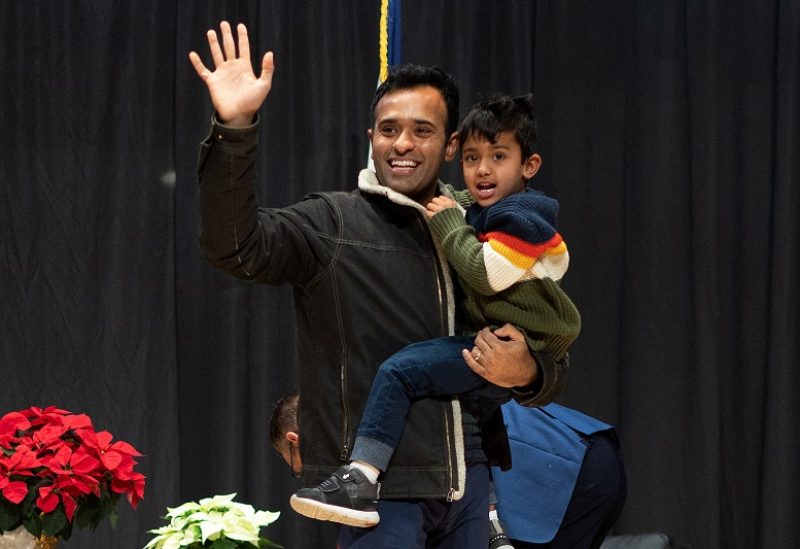 Republican presidential candidate and businessman Vivek Ramaswamy holds his son Karthik during the "Faith and Family with the Feenstras" event hosted by Rep. Randy Feenstra in Sioux Center, Iowa, U.S. December 9, 2023. REUTERS/Christopher Reistroffer