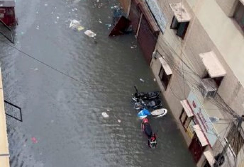 Scooters are partially submerged on a flooded street following heavy rains ahead of Cyclone Michaung in Chennai, Tamil Nadu, India December 4, 2023 in this still image obtained from social media. Chetna Vinay Bhora/via REUTERS THIS IMAGE HAS BEEN SUPPLIED BY A THIRD PARTY. MANDATORY CREDIT. NO RESALES. NO ARCHIVES.